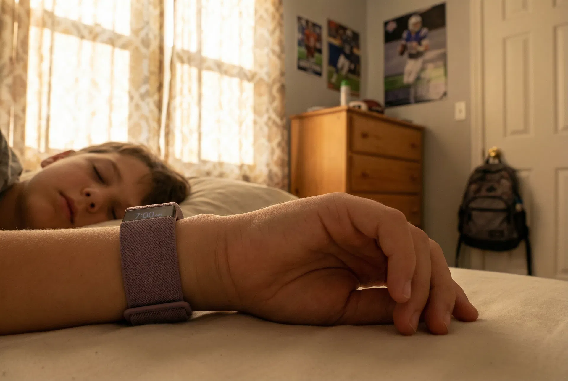 Boy sleeping peacefully with Nymera CalmRise wristband