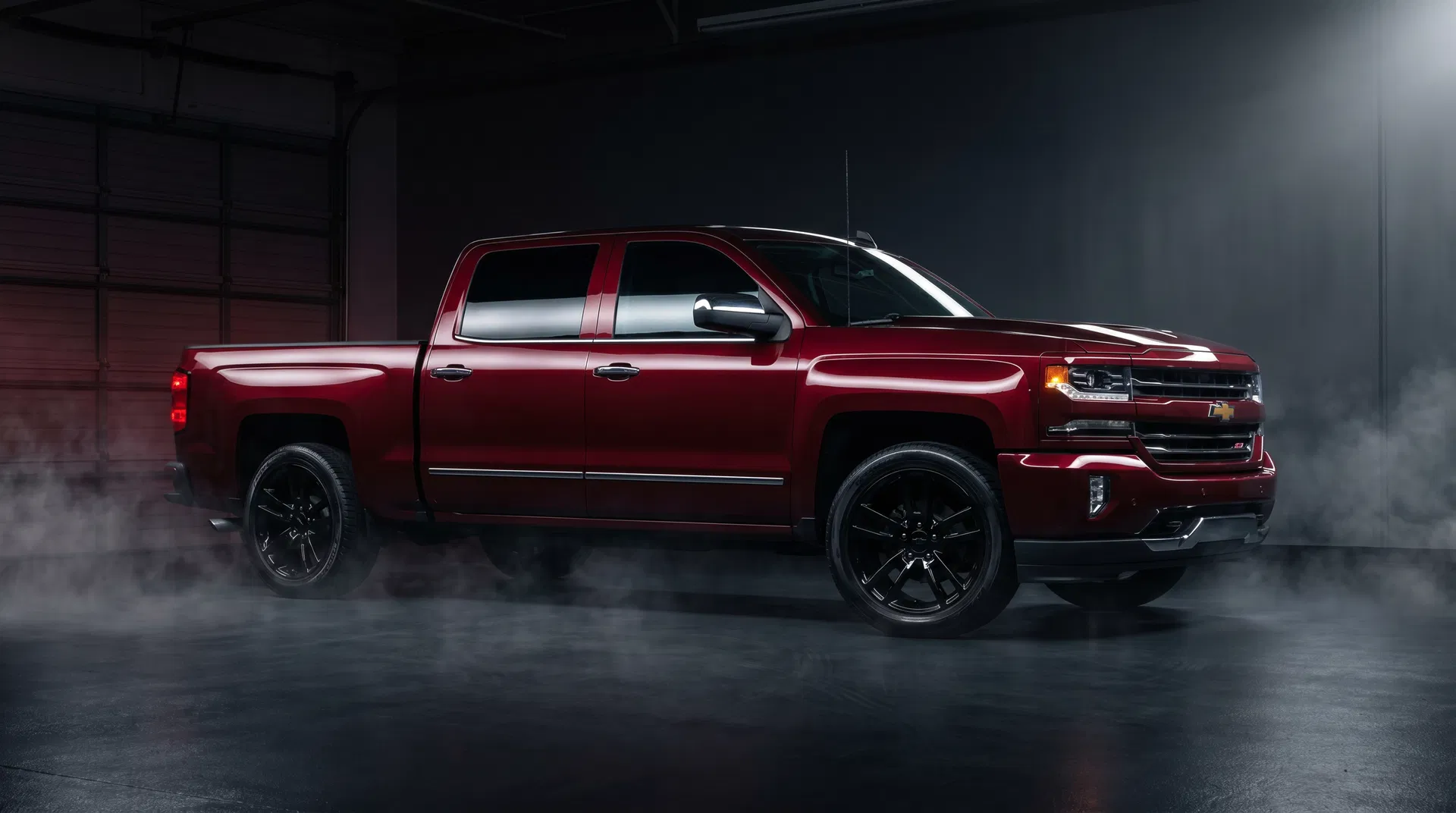 2016 Maroon Chevy Silverado LTZ with Black Rims