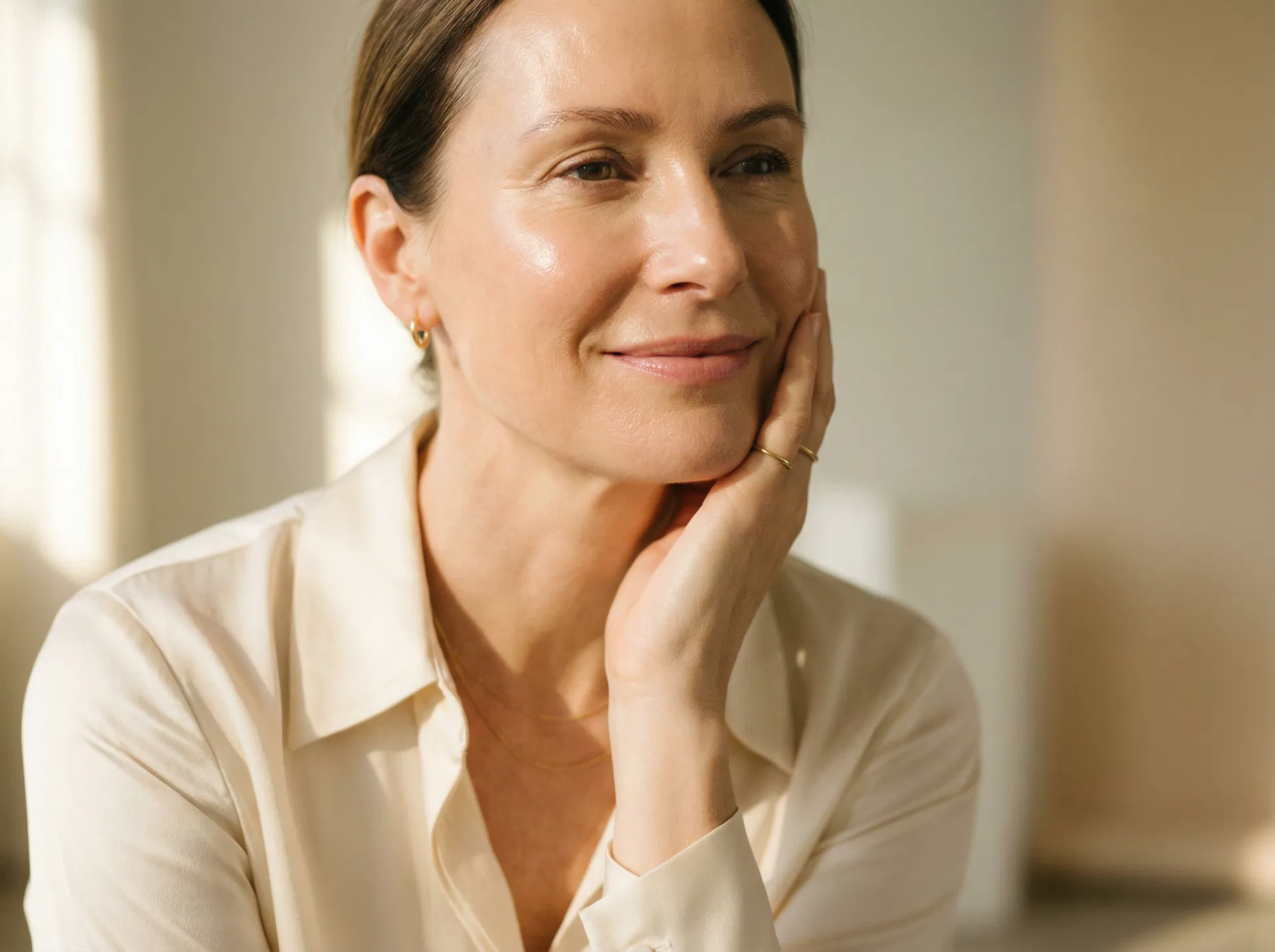Woman with smooth, radiant neck and jawline