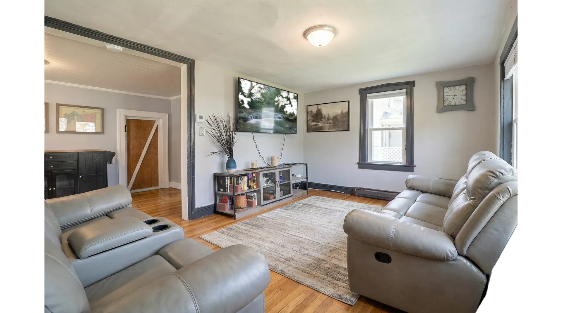 Bright common rooms anchor the main home.