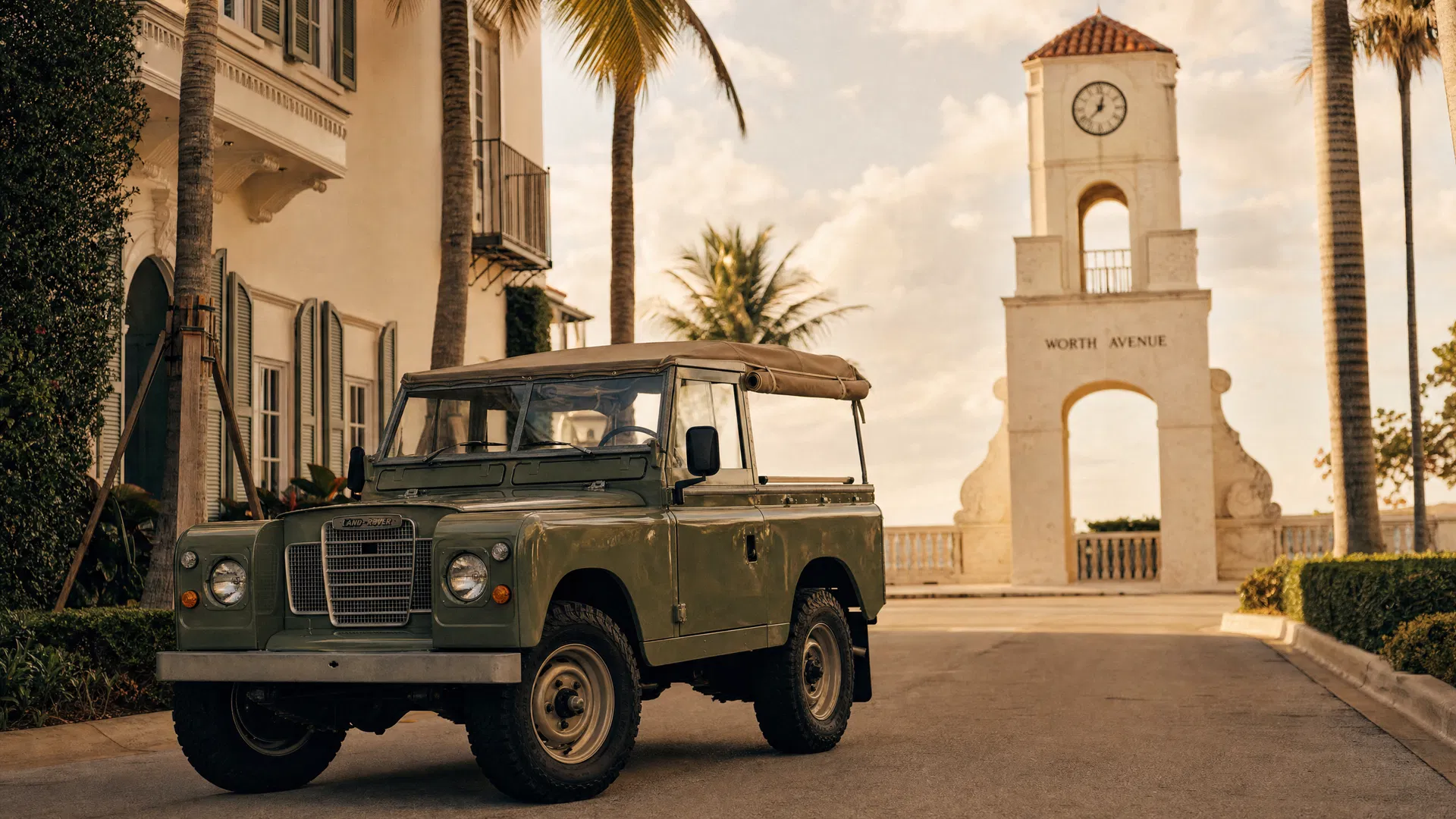 Vintage Land Rover in front of the Worth Avenue clock tower, Palm Beach