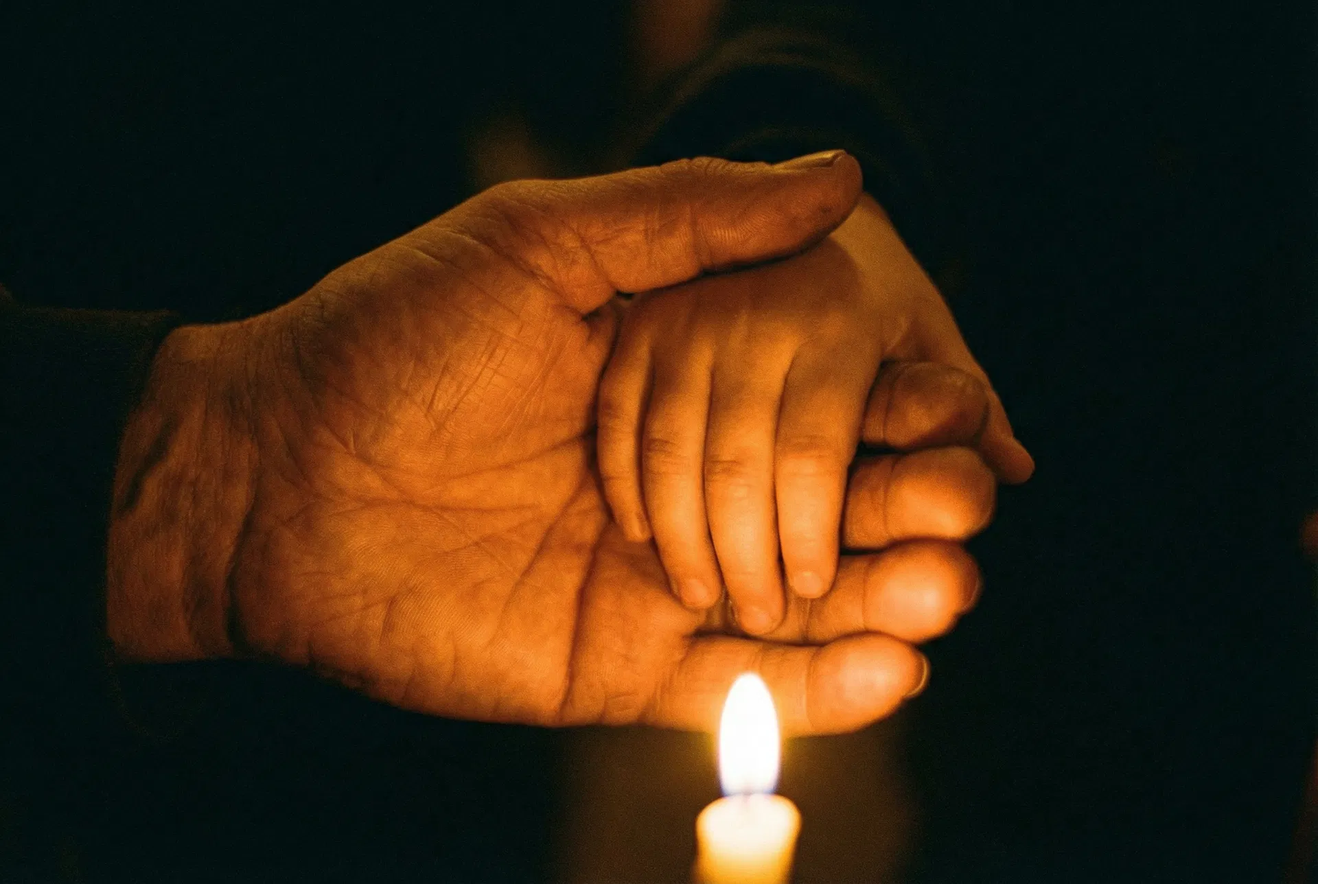 Hands clasped together in protection and hope