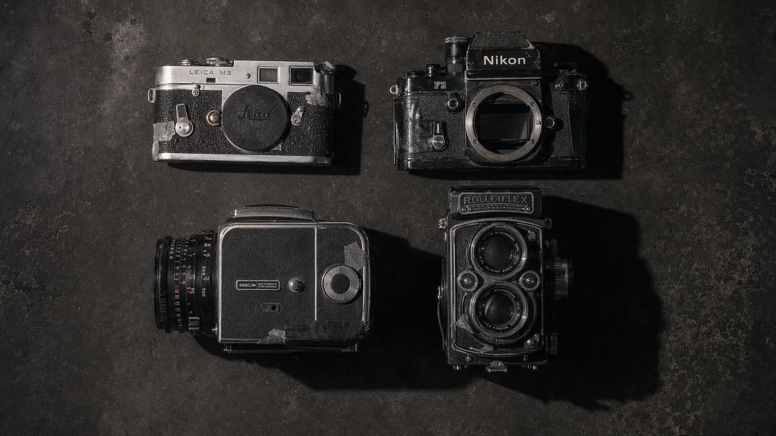 Vintage film cameras: Leica M3, Nikon F2, Hasselblad 500C/M, Rolleiflex 2.8F