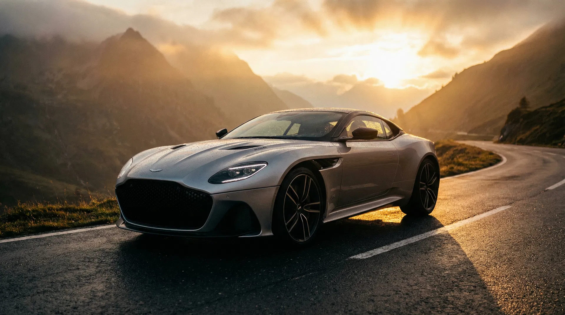 Cinematic luxury car on mountain road at golden hour