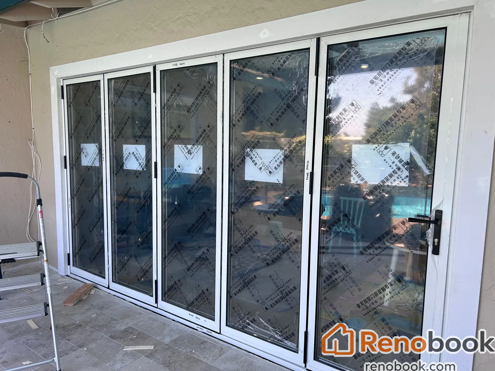 Cupertino change a door to folding glass door