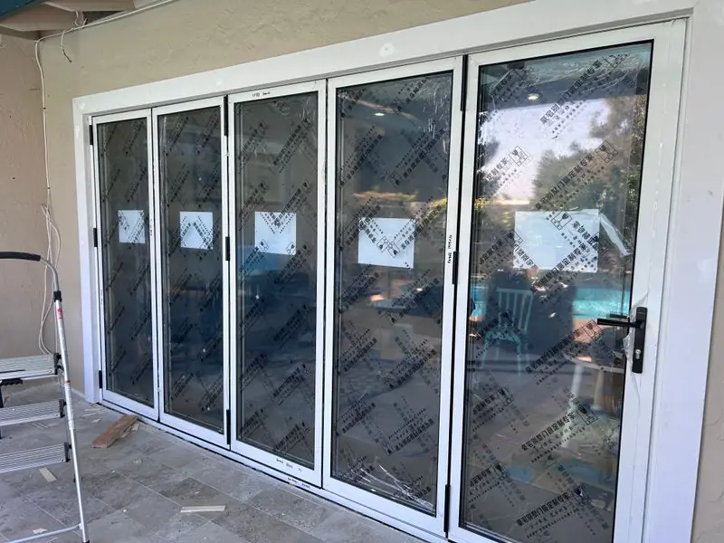 Cupertino change a door to folding glass door