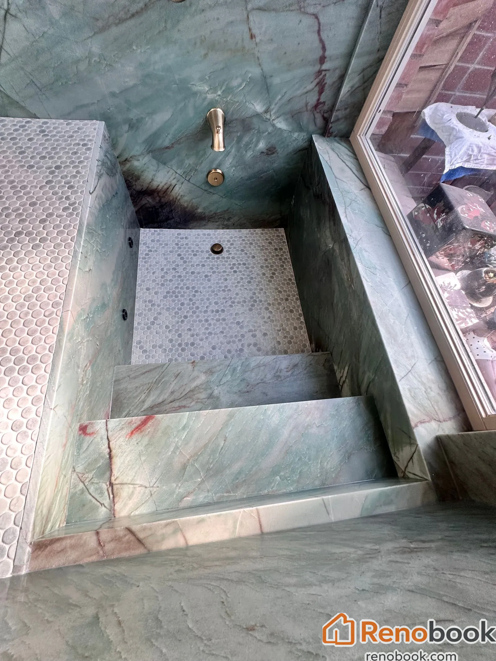 Quartzite custom tub/shower with jets