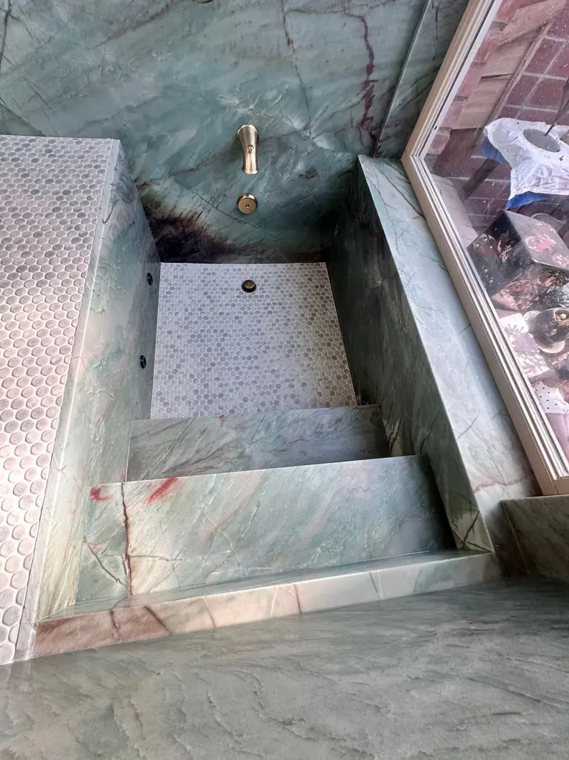 Quartzite custom tub/shower with jets