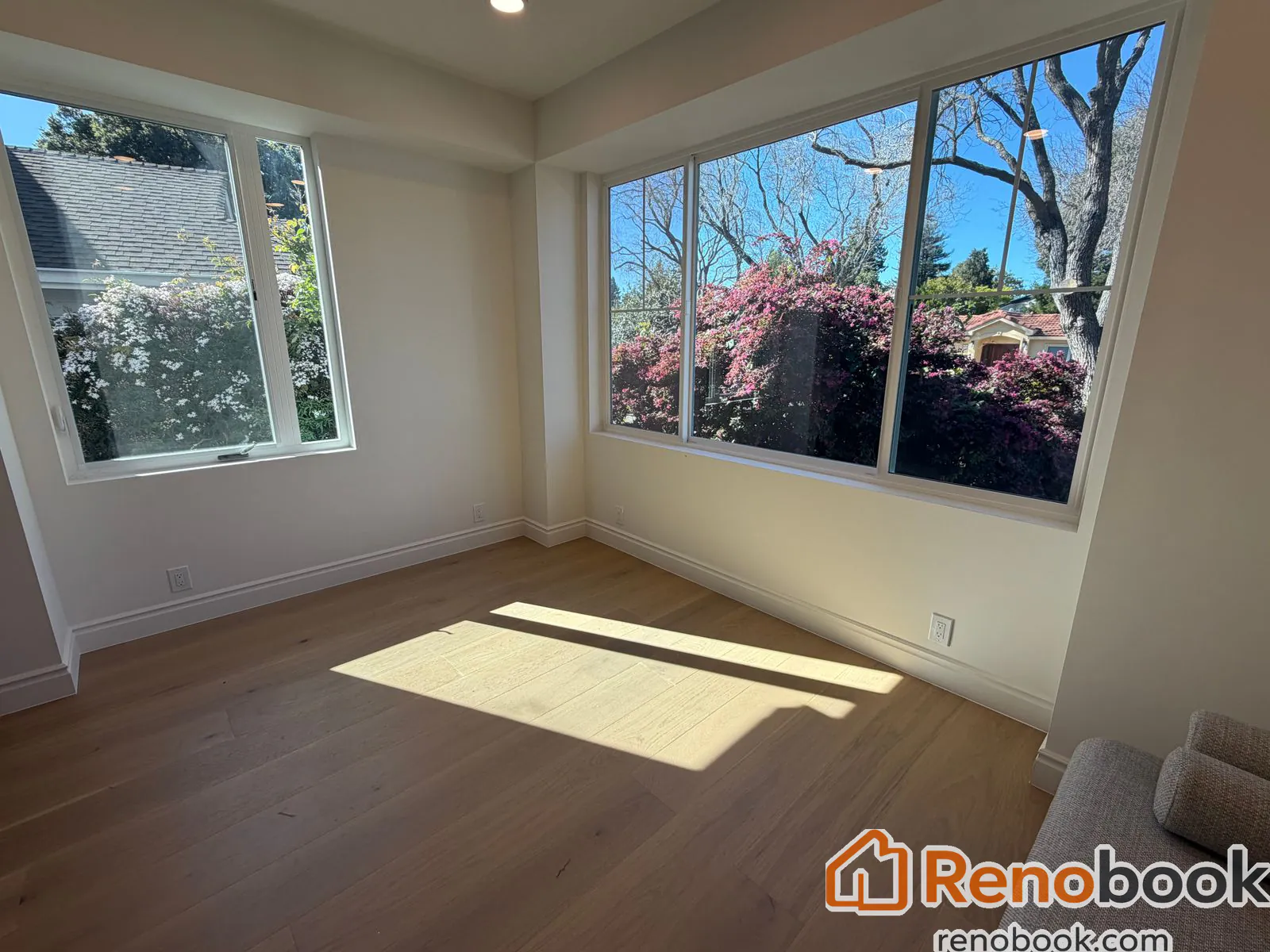 Replace a portion of the problematic flooring in a homeowner's living room