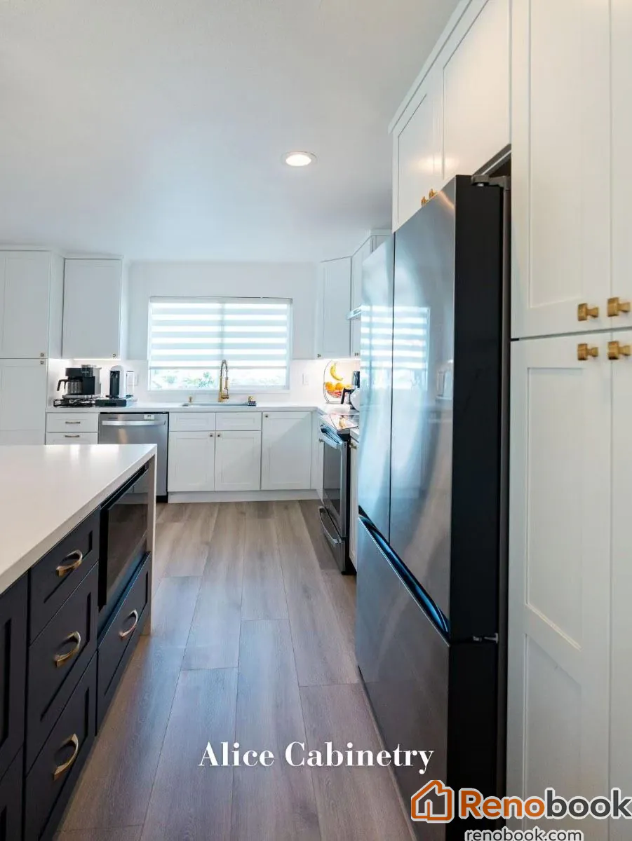 Modern kitchen with navy island, white quartz waterfall countertop, and gold accents in San Leandro, CA, USA