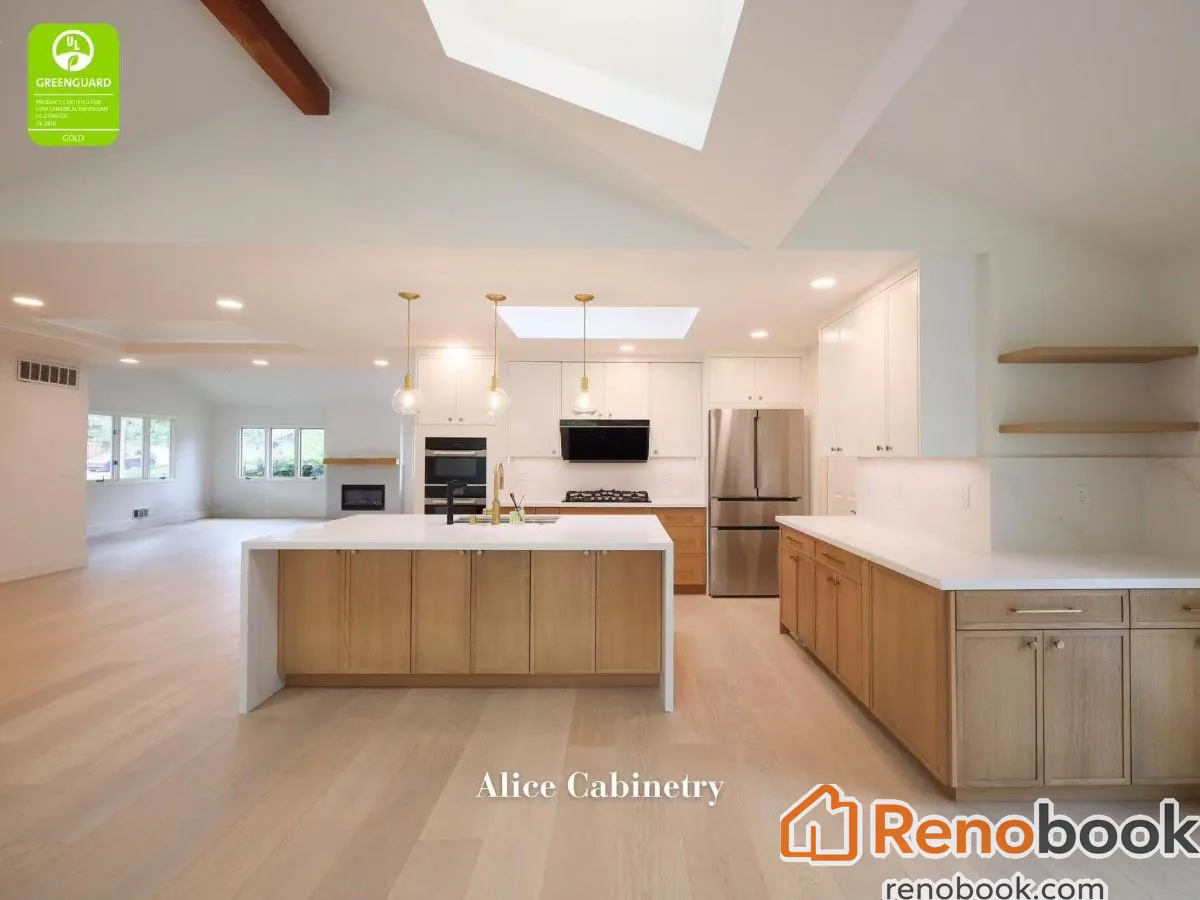 Modern two-tone kitchen with light wood cabinetry, quartz island, and skylights in San Leandro, CA, USA