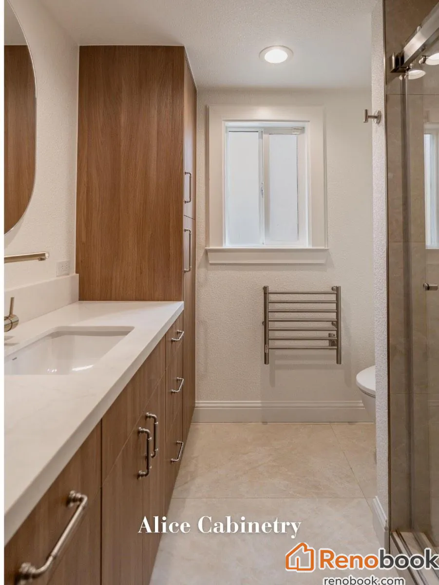 Modern walnut bathroom vanity with white quartz counter & brass faucet in San Leandro, CA, USA