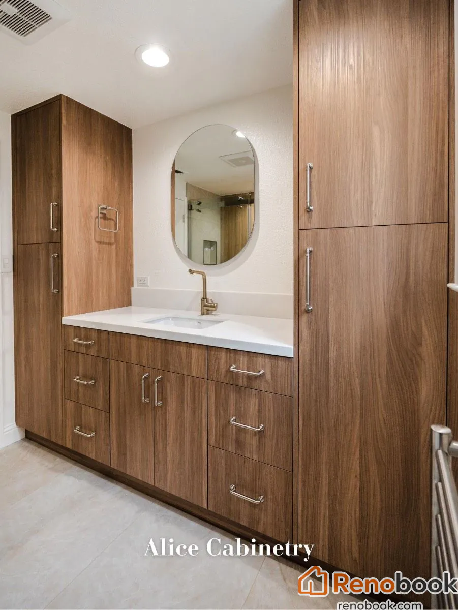 Modern walnut bathroom vanity with white quartz counter & brass faucet in San Leandro, CA, USA