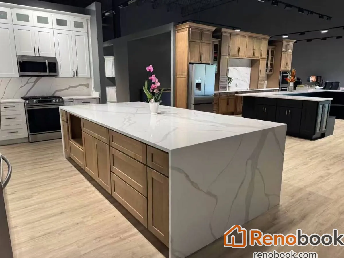 Two-tone shaker kitchen with gray and white cabinets, quartz counters, and island in Pomona, CA, USA