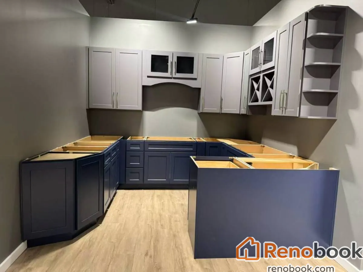 Two-tone shaker kitchen with gray and white cabinets, quartz counters, and island in Pomona, CA, USA