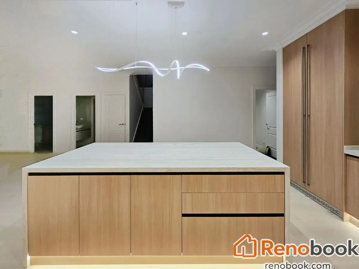 Modern light wood kitchen with fluted island and integrated appliances in Melbourne VIC, Australia
