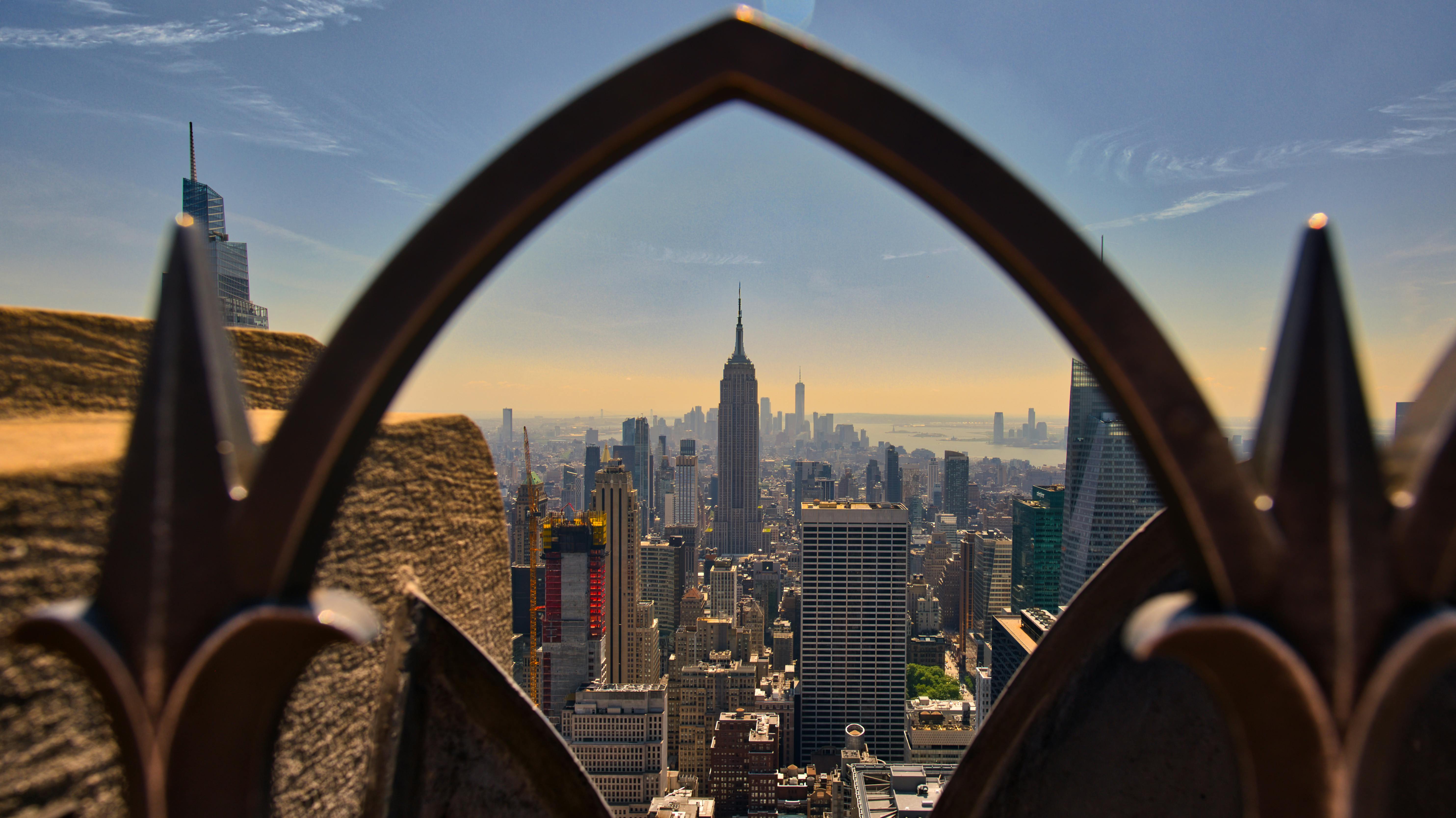 New York City Skyline Through Ornate Railing