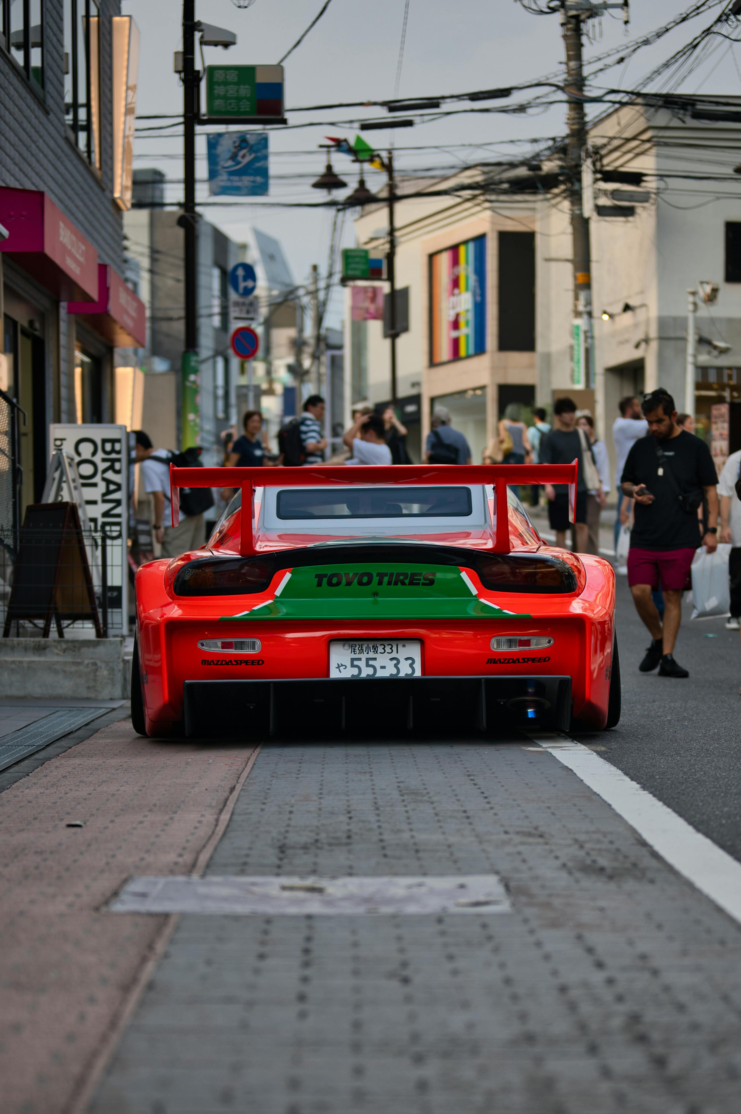 Red Modified Sports Car on Japanese Street