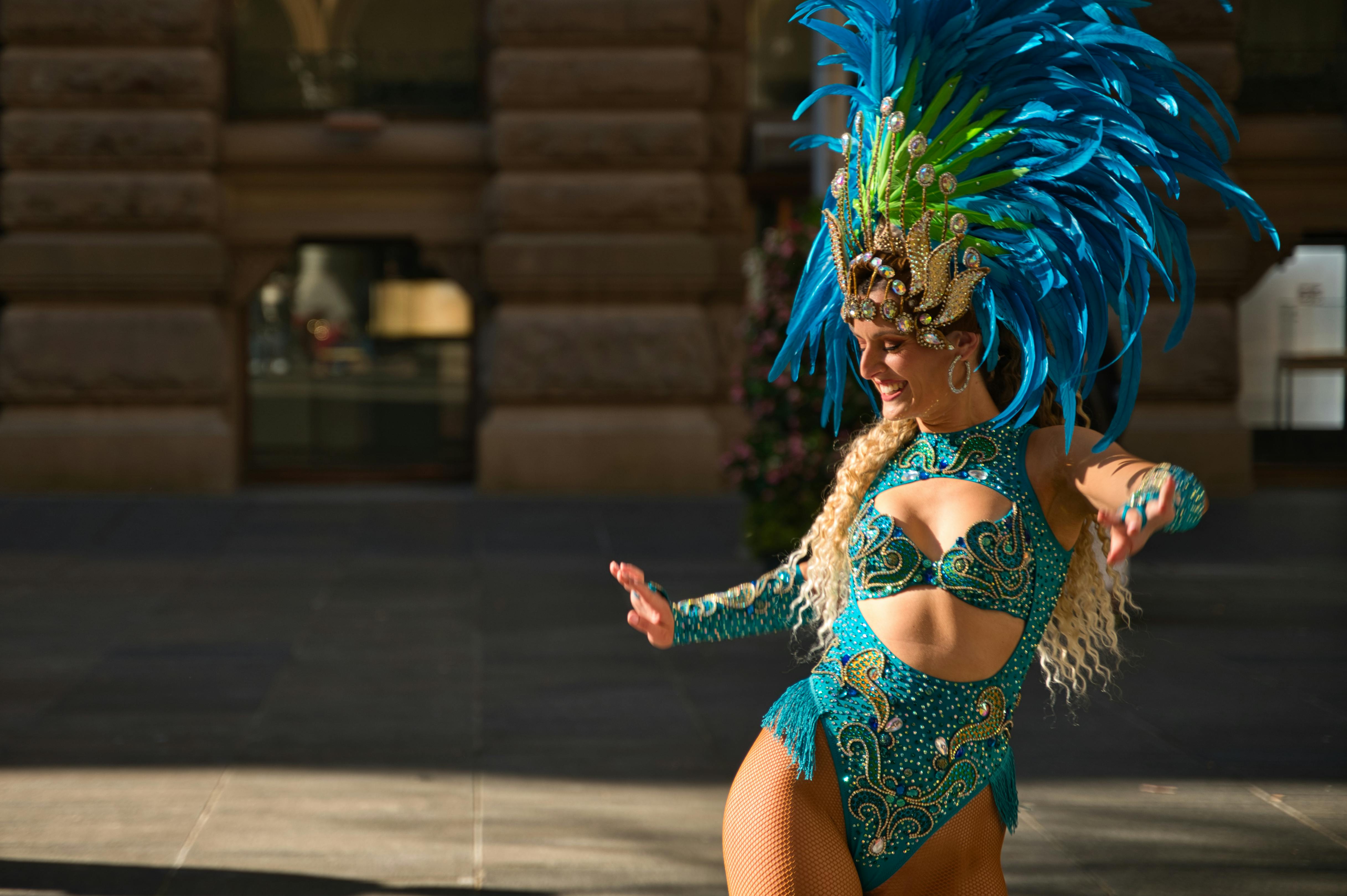 Joyful Woman Dancing in Vibrant Carnival Costume