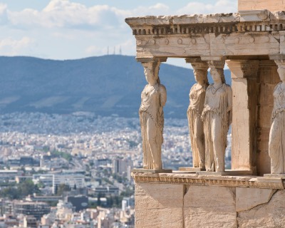 Ancient Caryatids Overlooking Athens Cityscape, Greece