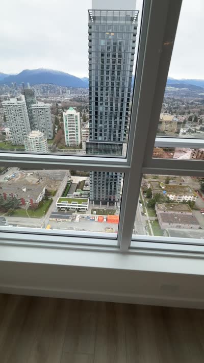 High-Rise City View With Mountains