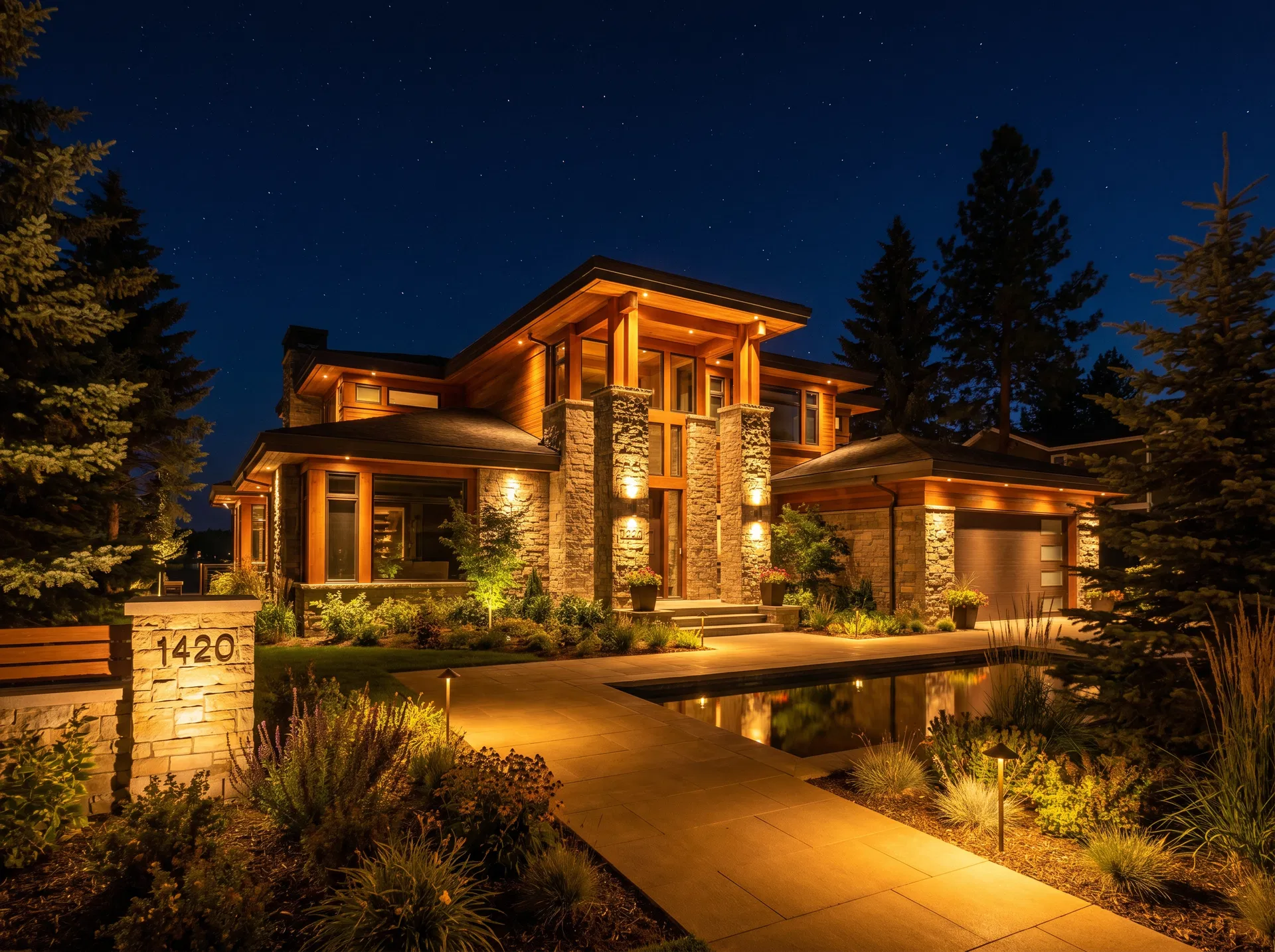 Luxury residential home with professional exterior lighting installation — Modern Electrical Contractors INC