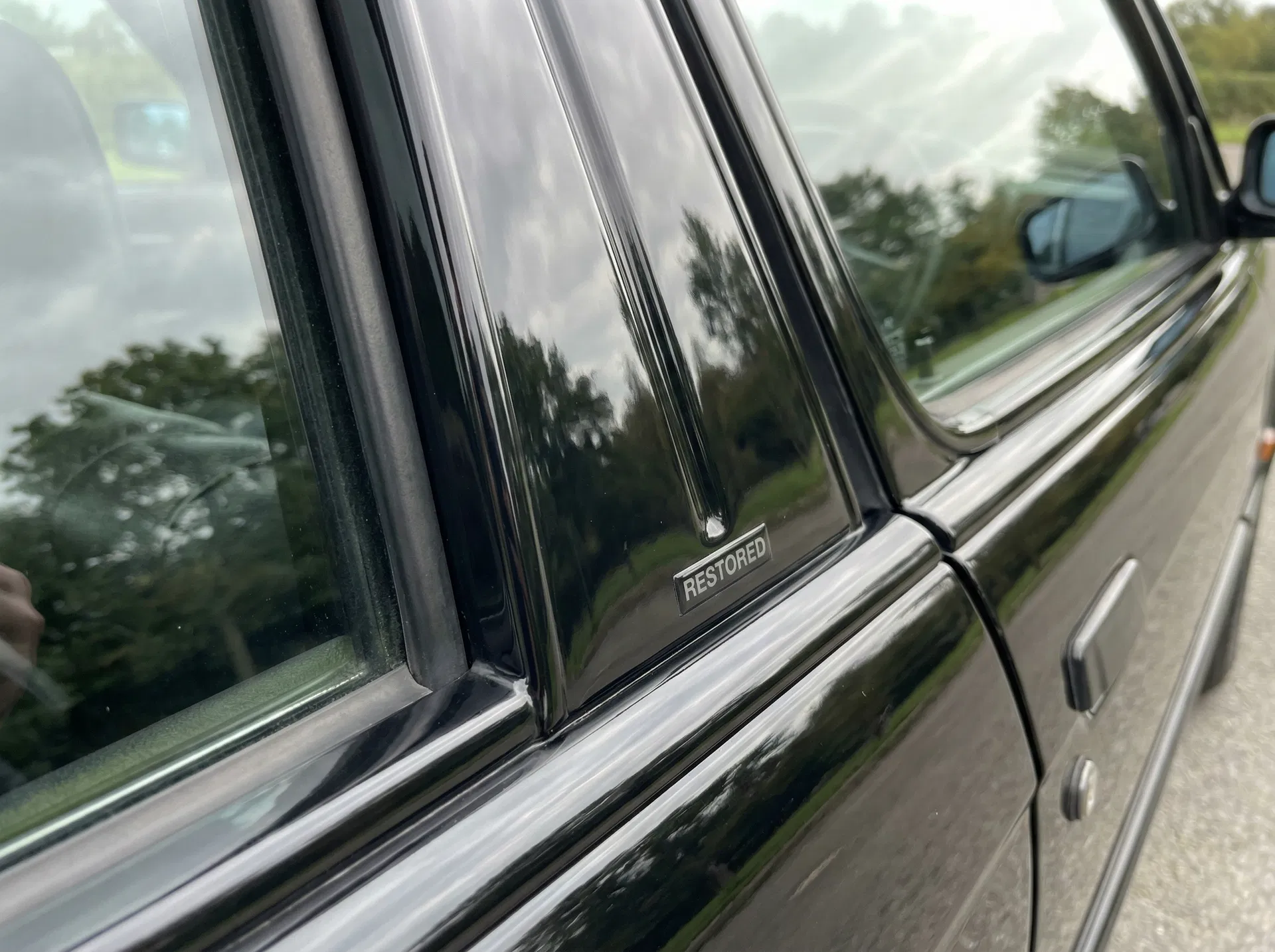 After: Restored deep black plastic trim