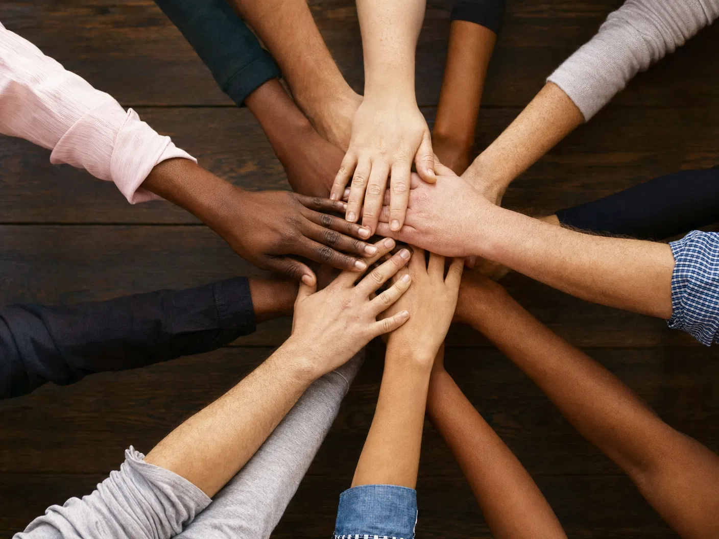 Community members joining hands — representing HealthShare community