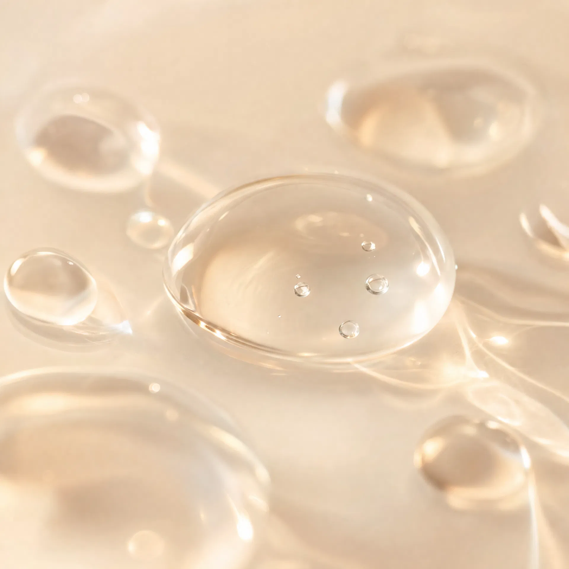 Hyaluronic Acid — clear gel drops macro photography