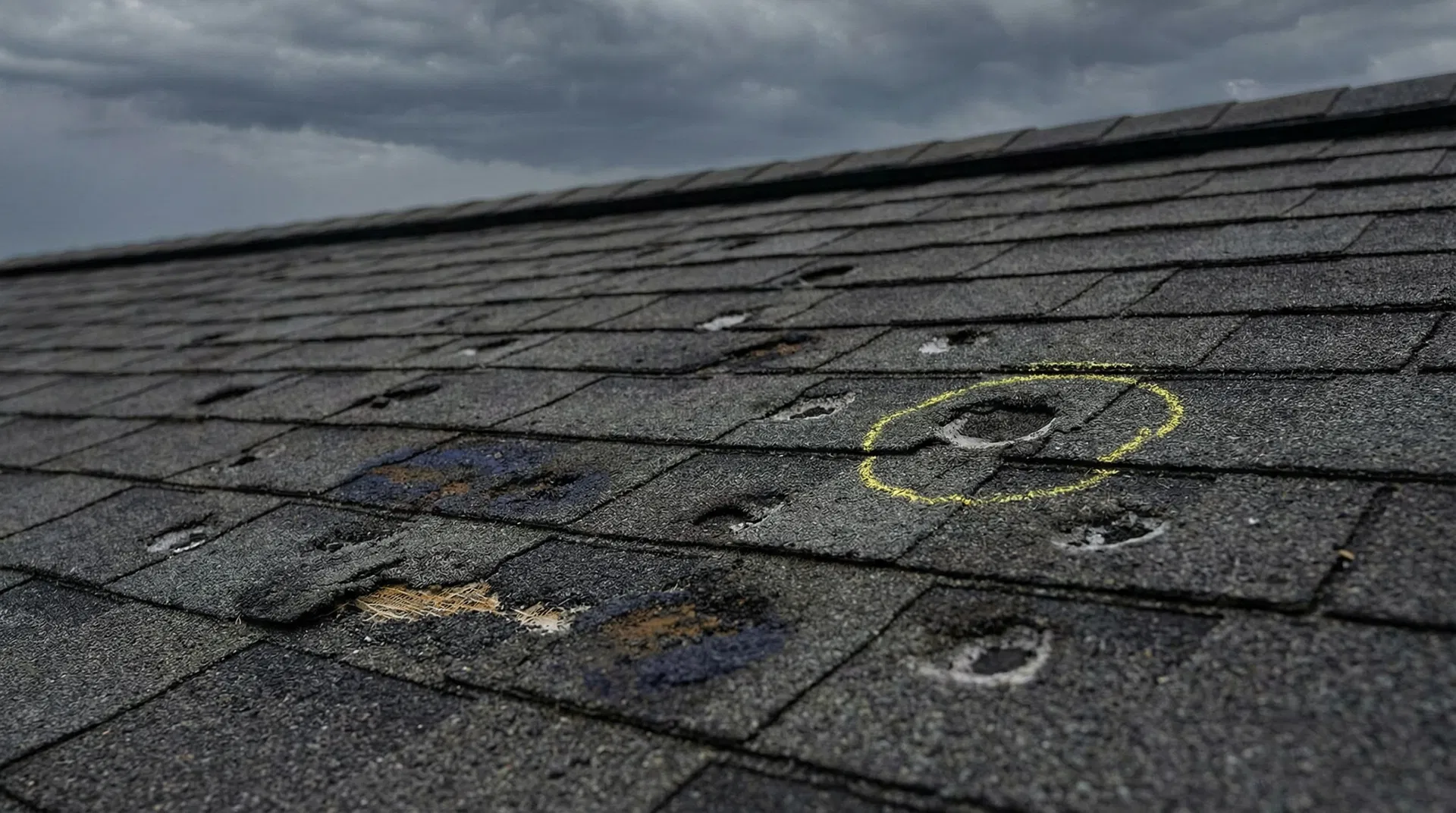 Hail damage on residential roof shingles — H Town Roof & Constructions inspection