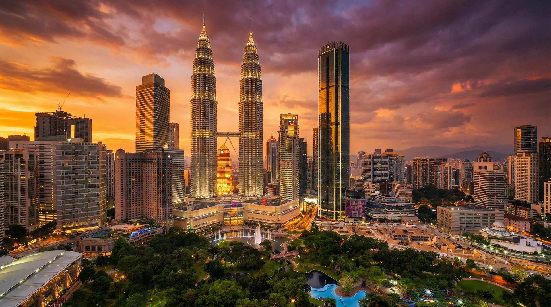 Petronas Twin Towers and Kuala Lumpur skyline at sunset