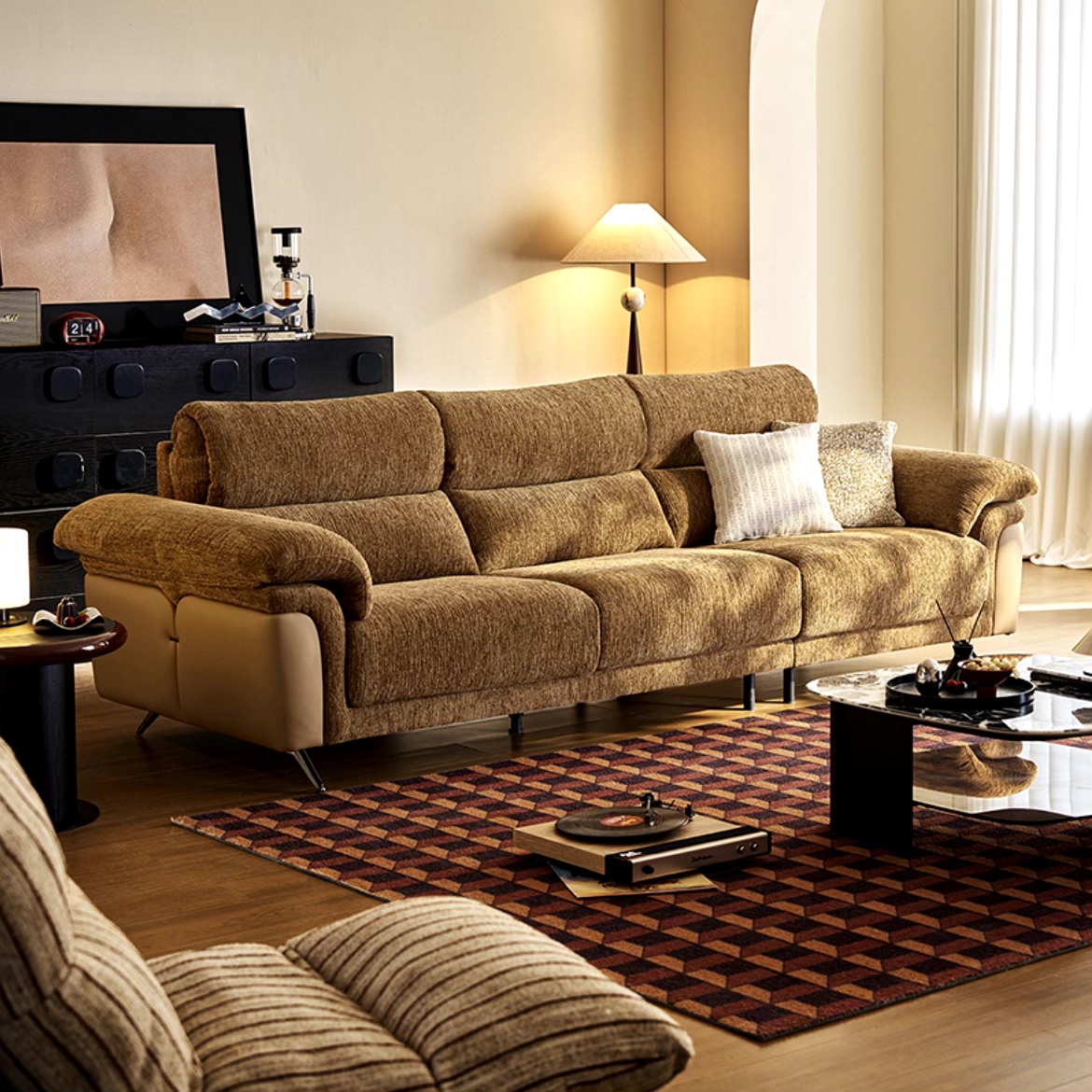 Warm brown Avalon 3 Seater Fabric Sofa in a cozy living room.