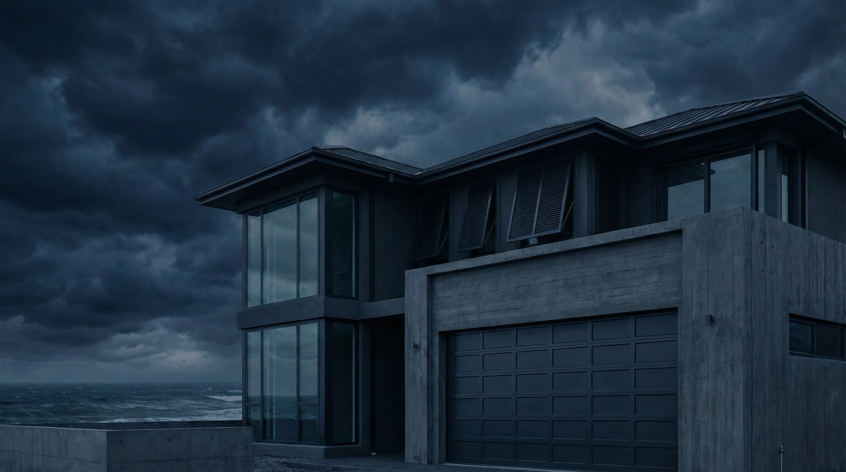 Hurricane shutters protecting windows on a coastal home