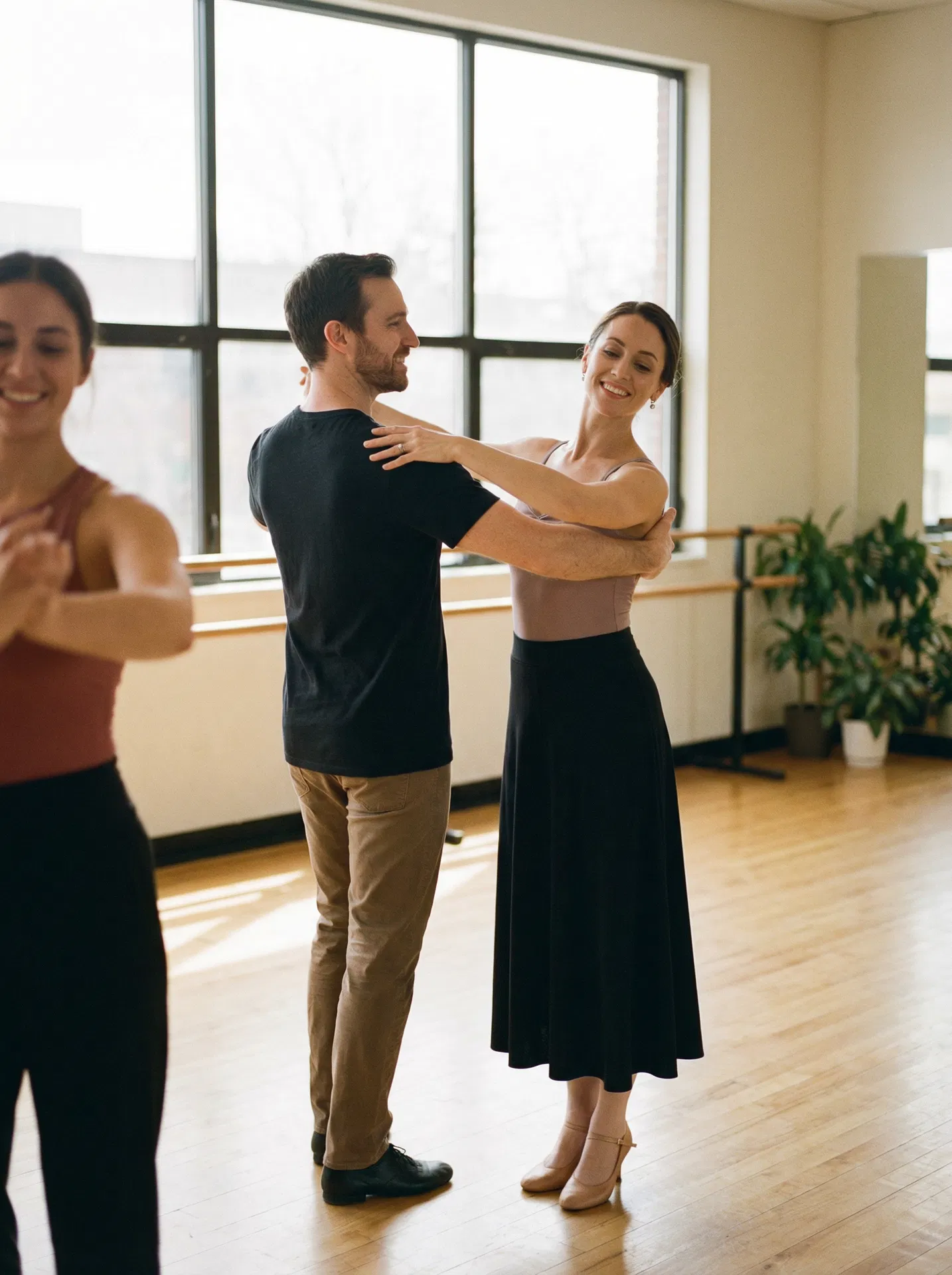 Kerry White teaching a couple to dance