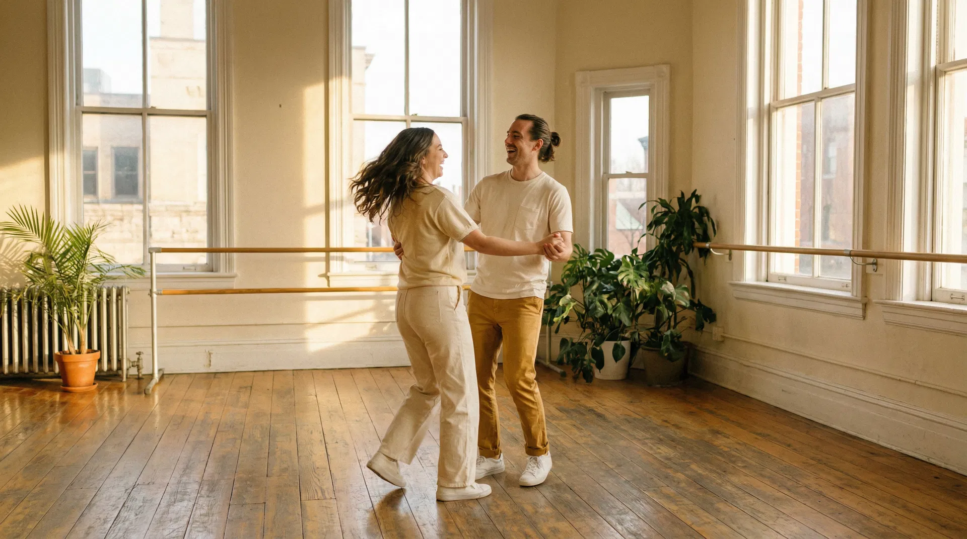 Couple rehearsing their wedding dance in a studio