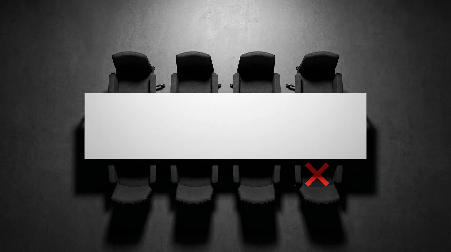 Seven chairs around a conference table