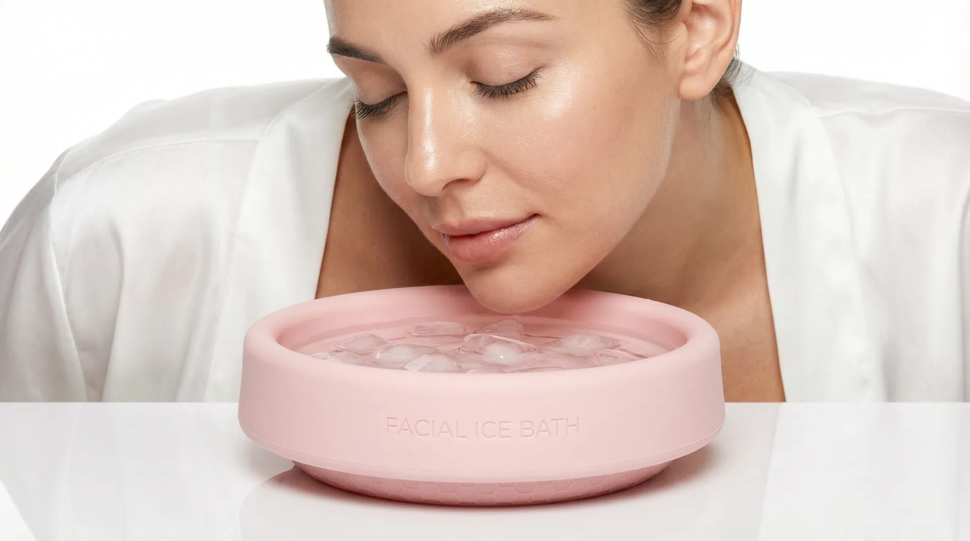 Woman using ice facial bowl