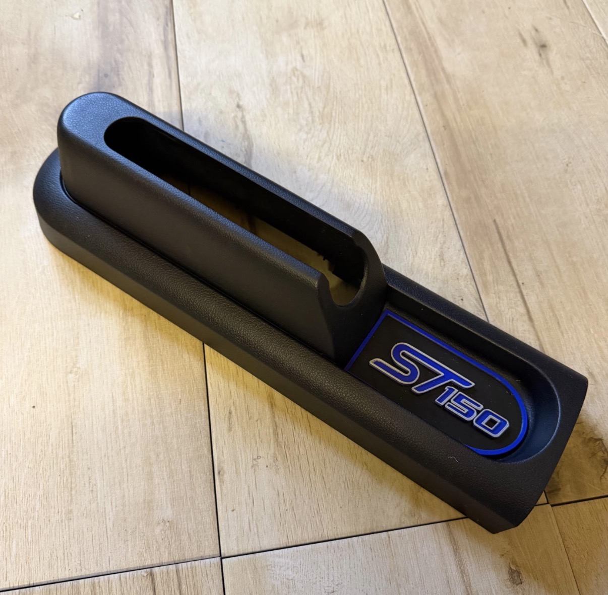 ST150 handbrake trim with 3D printed ST150 logo