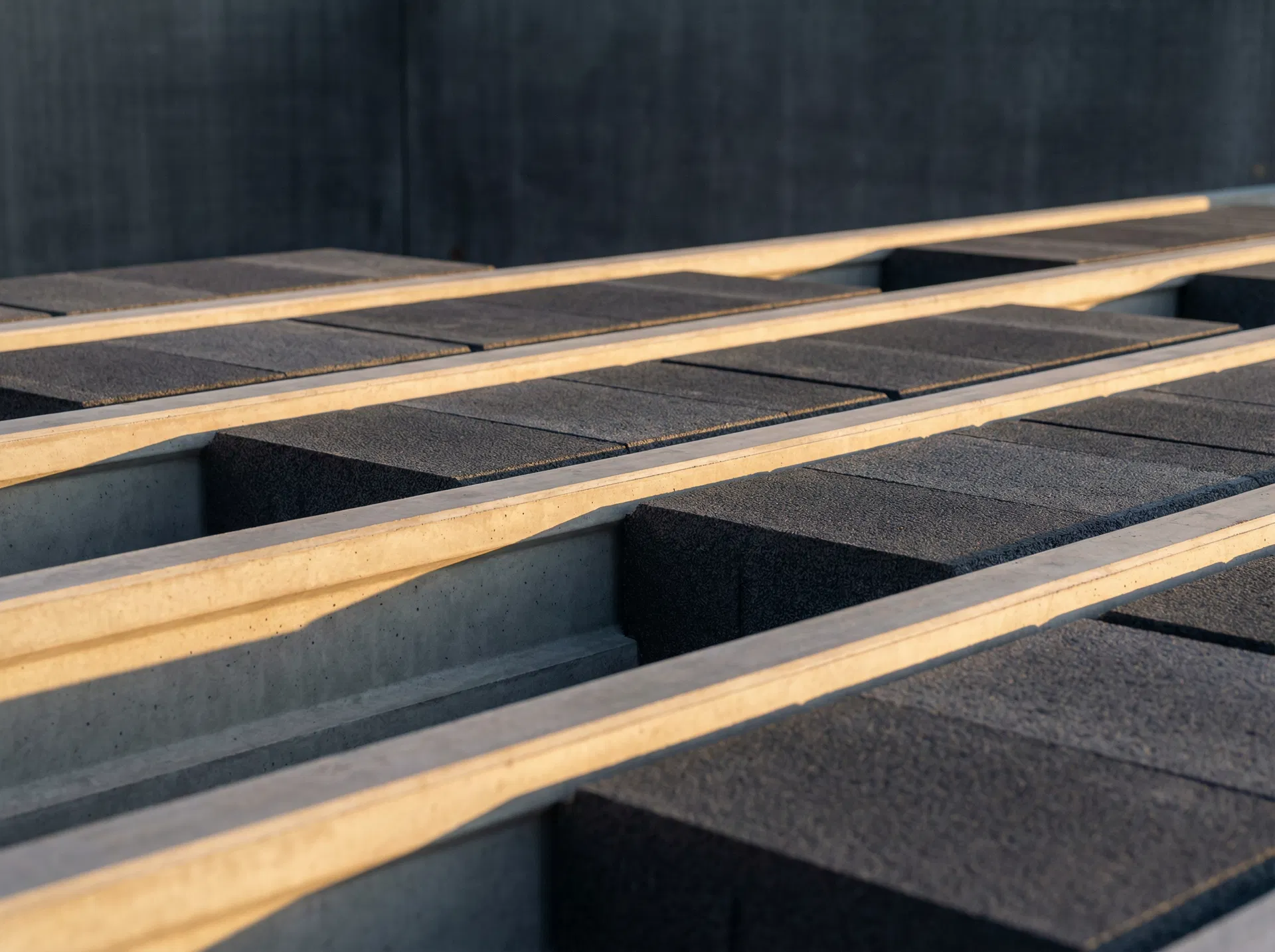 Close-up of ECO-SPAN beam-and-block floor system — precast beams with non-combustible block infill