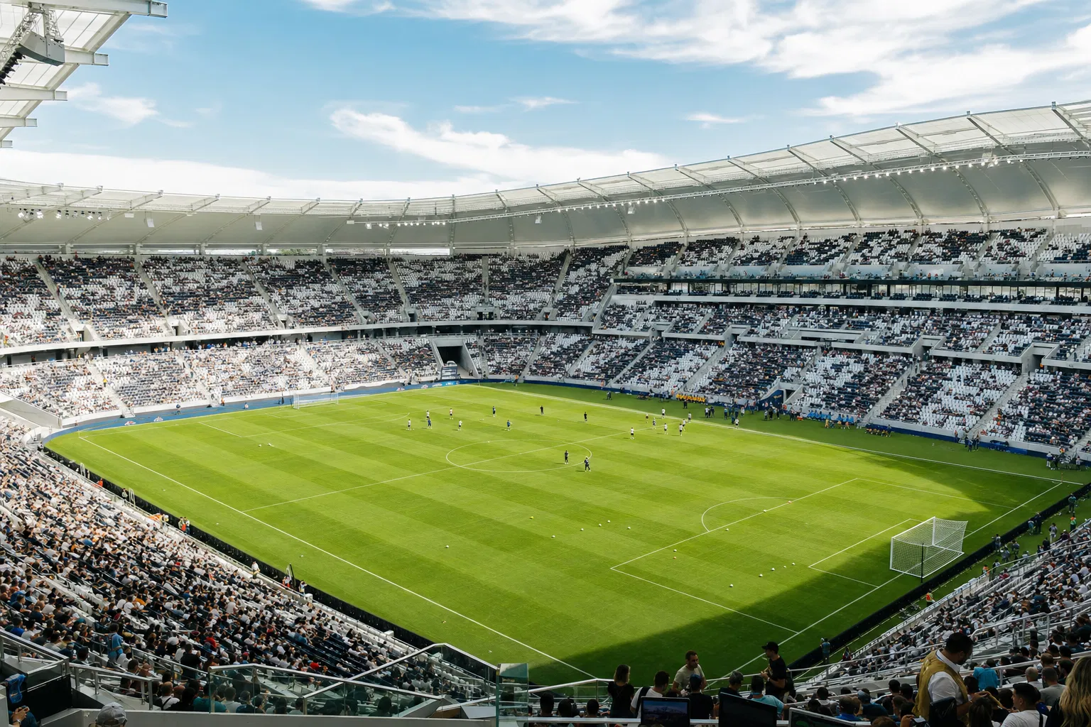 Floodlit stadium during a top-flight football match used as cover image for the FEESZ league case study.