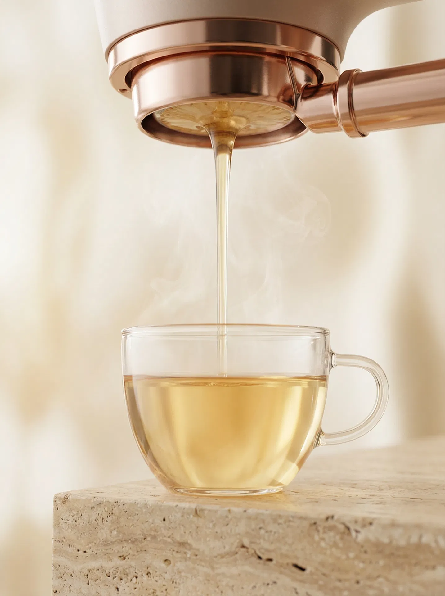 Pure tea brewing from the One Tea teapresso machine into a glass cup