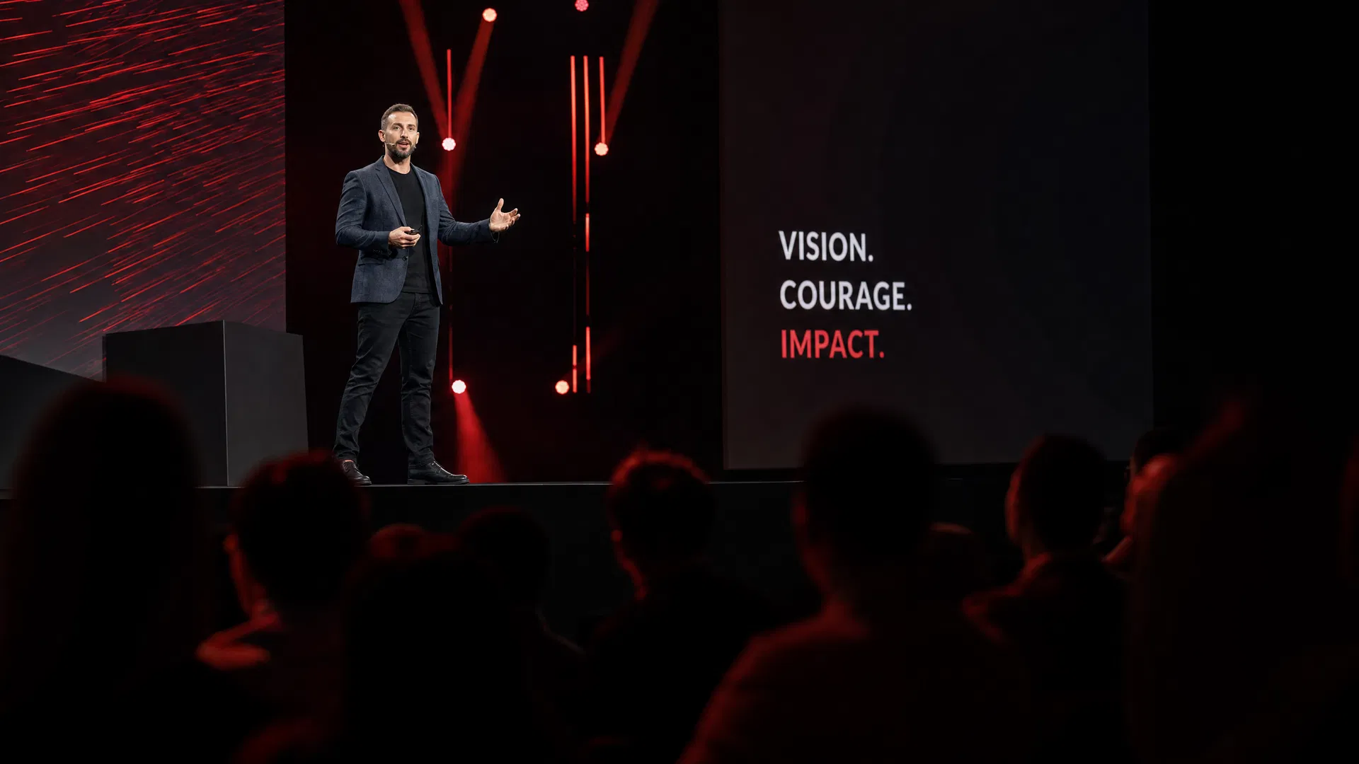 Jason Farris speaking on stage