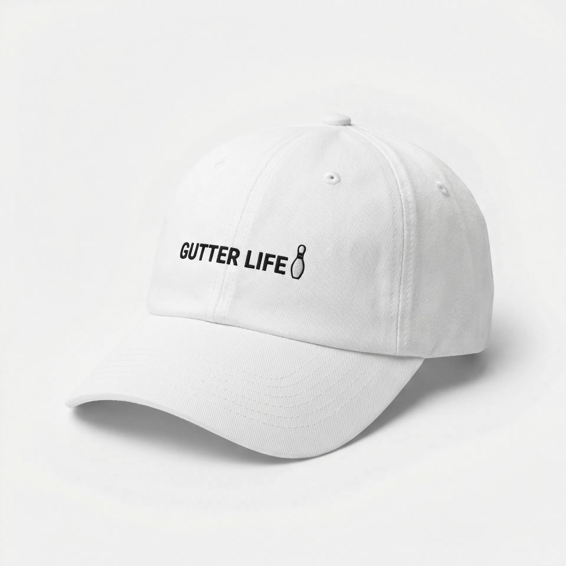 Gutter Life dad hat in white with bowling pin embroidery
