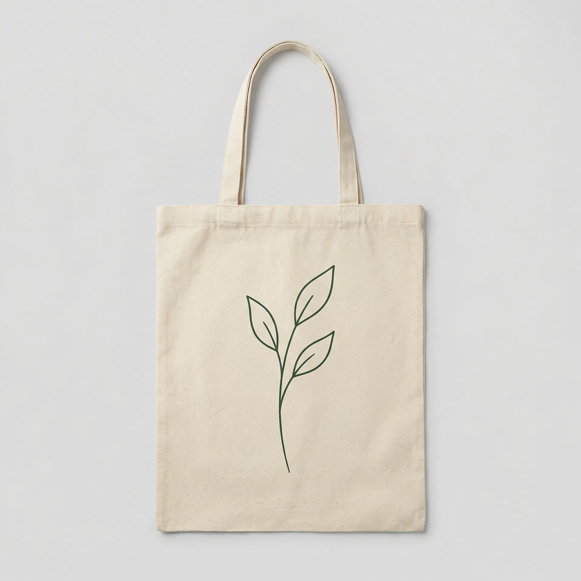 Natural canvas tote bag with minimalist botanical leaf design