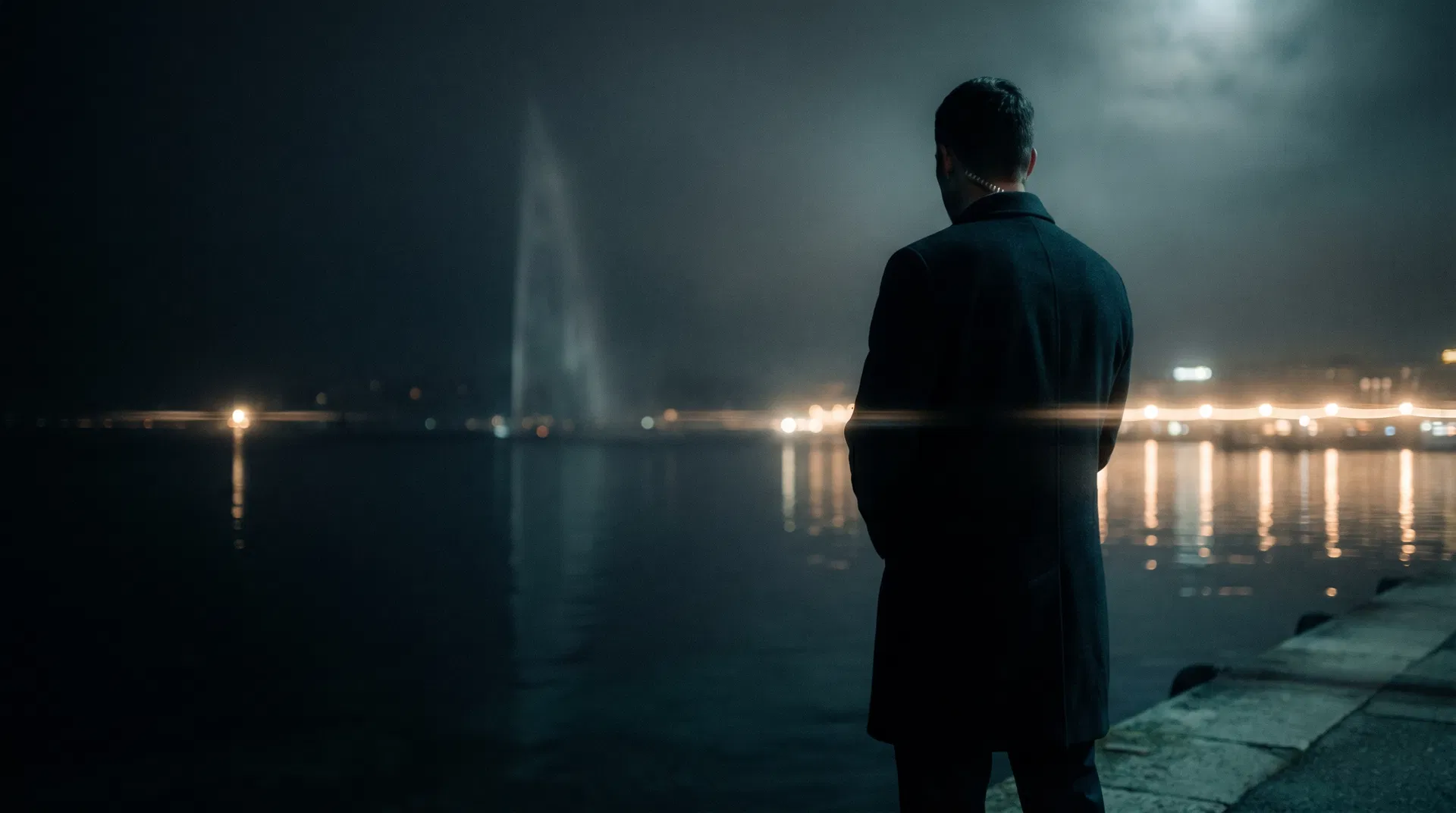Cinematic view of Geneva at night with a protection officer in silhouette