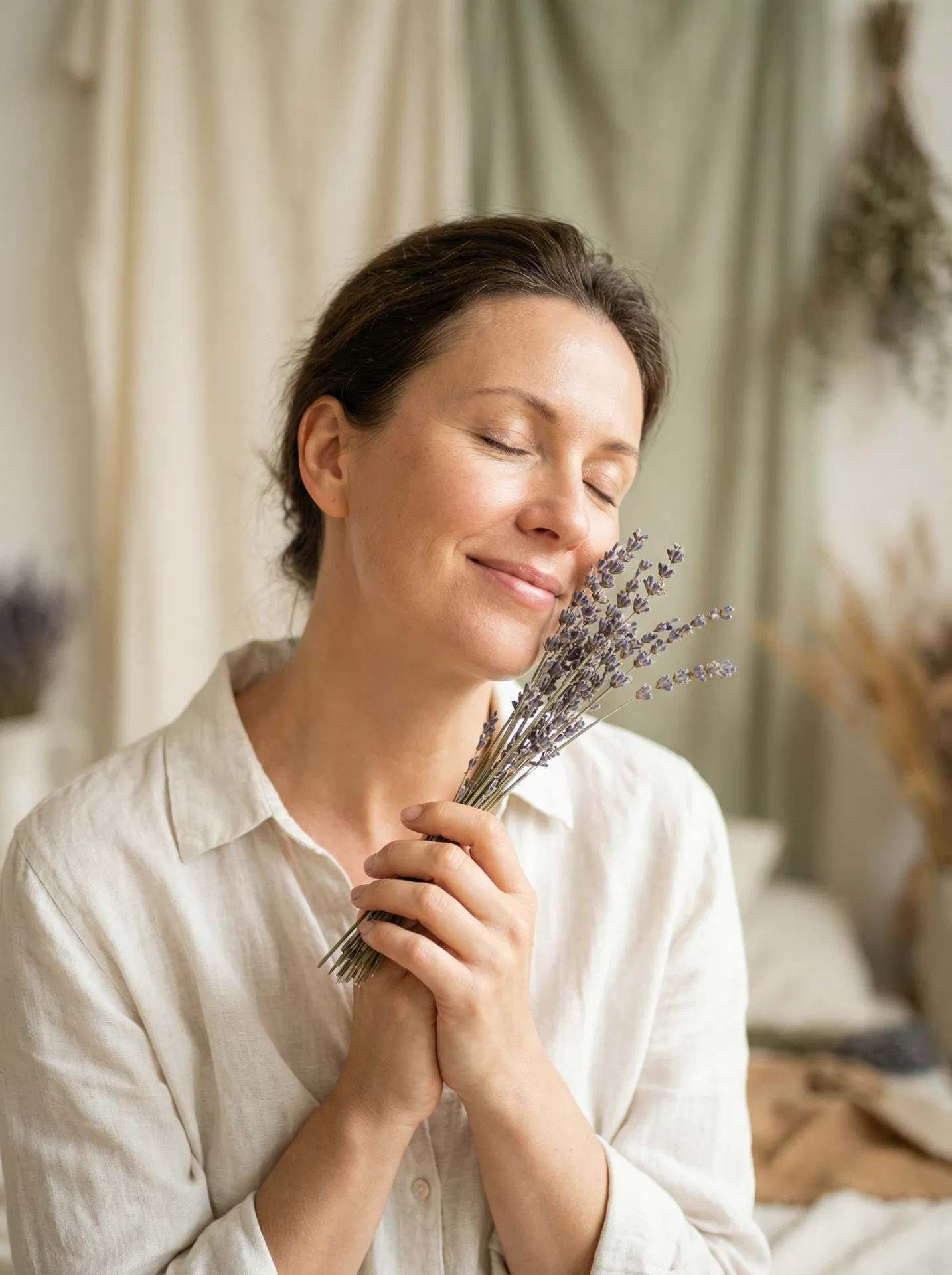 Woman enjoying lavender aromatherapy