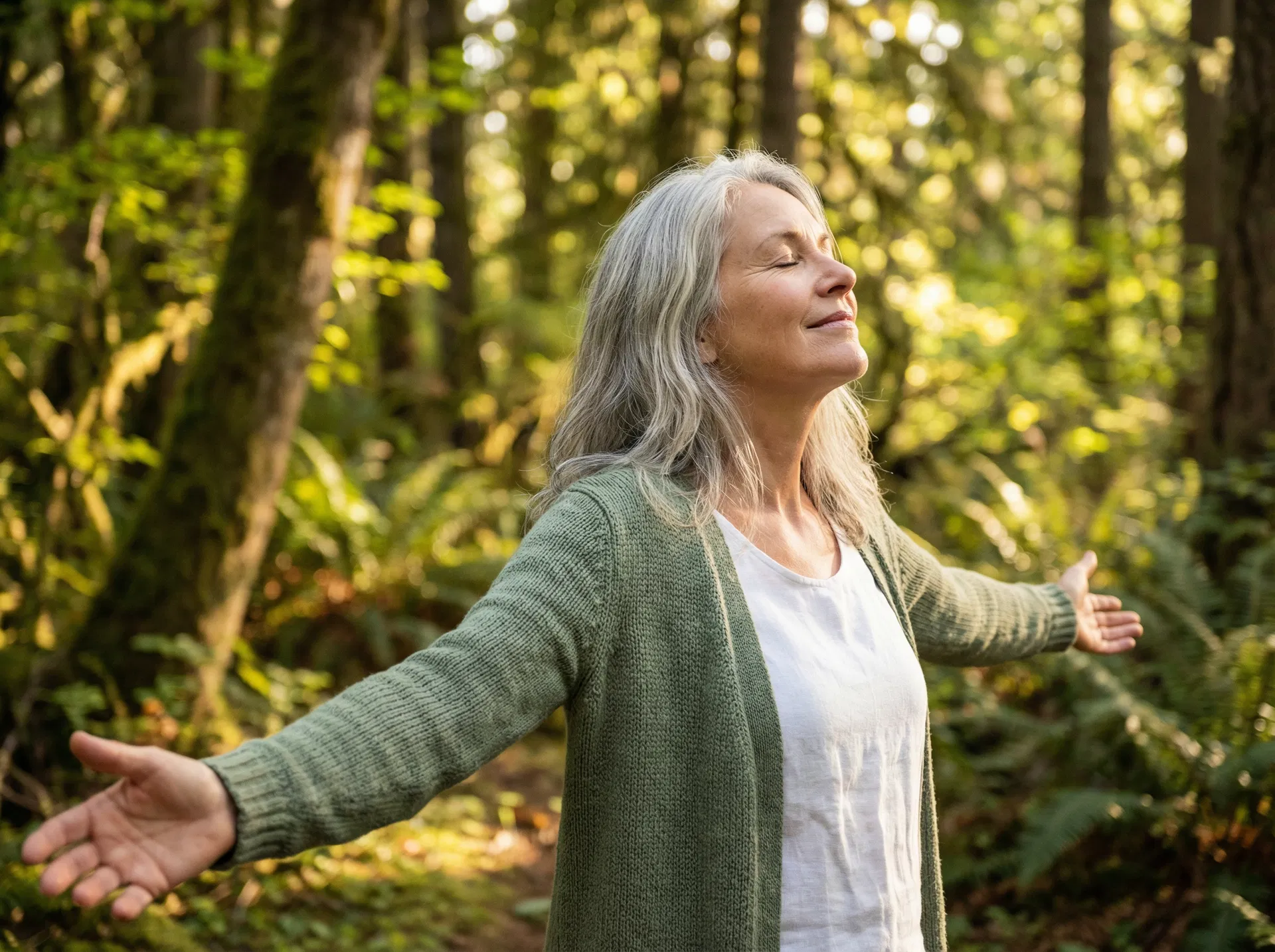 Woman breathing freely in nature