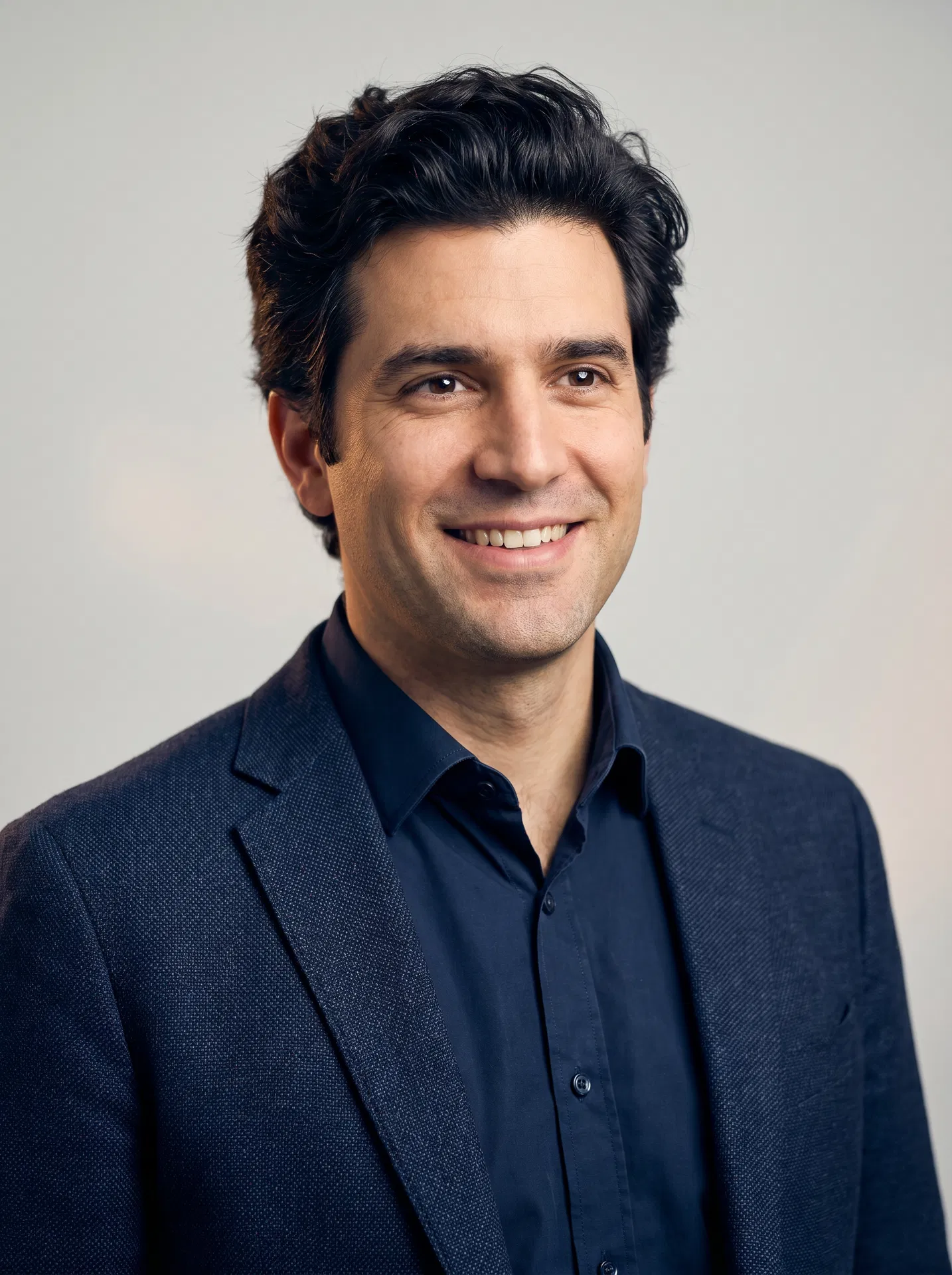 Confident man with full hair after ReGrow Medical FUE transplant