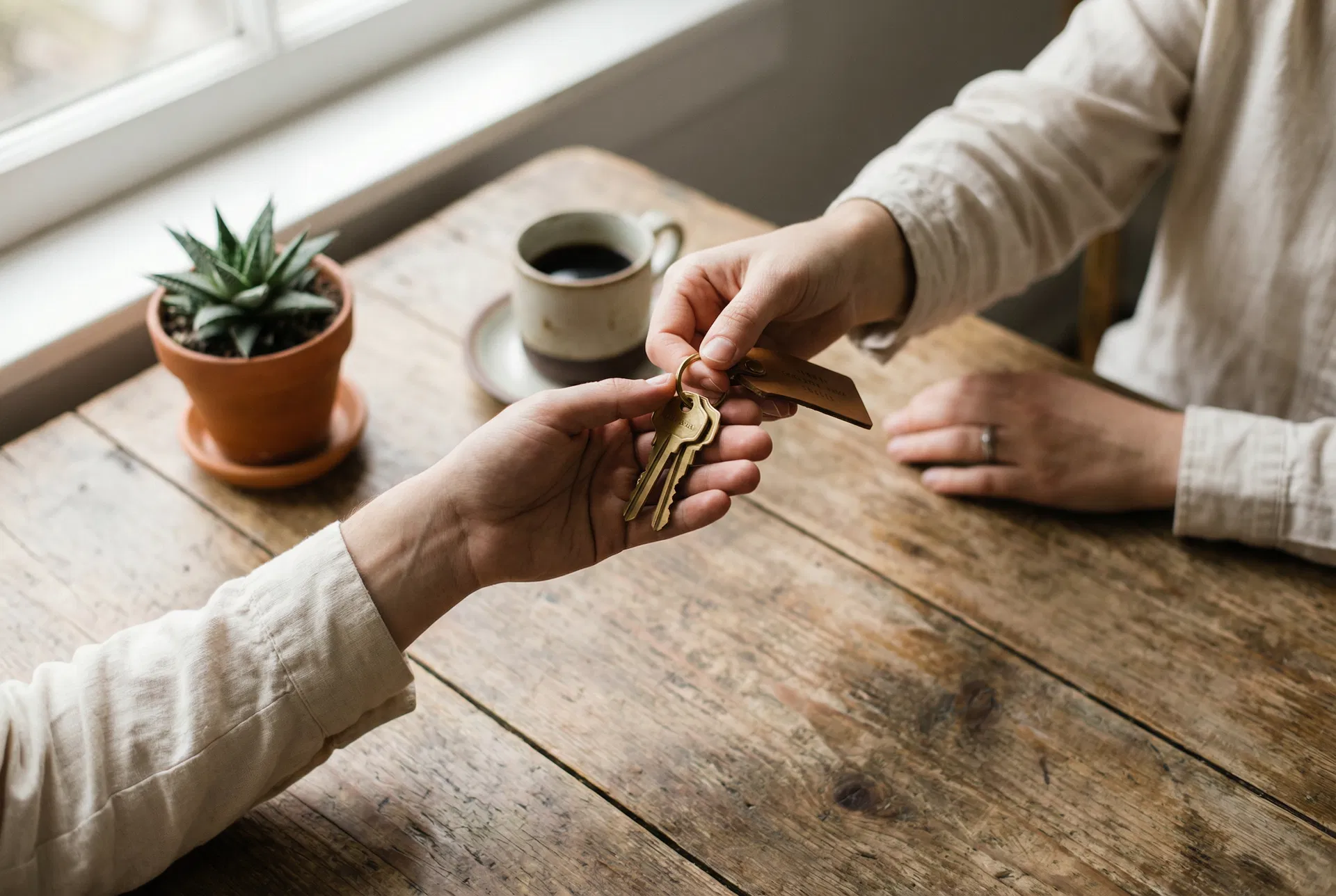 Handing over keys, the beginning of a Plum and Vale partnership