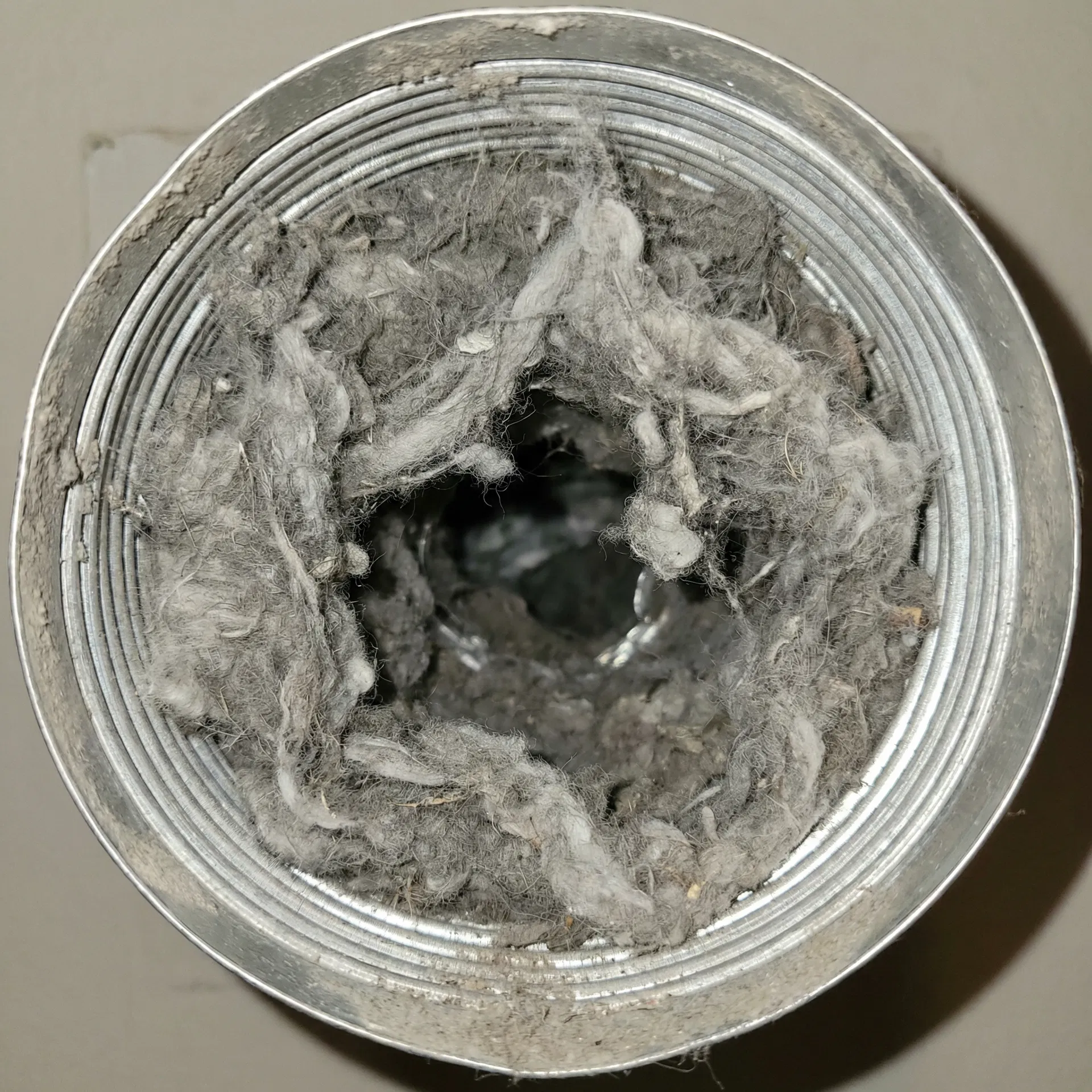Vent Duct Interior before cleaning - clogged with lint